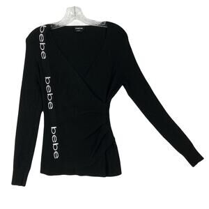 NWOT BEBE Sweater L Black White Logo Spellout Faux Wrap Pleated Long Slv